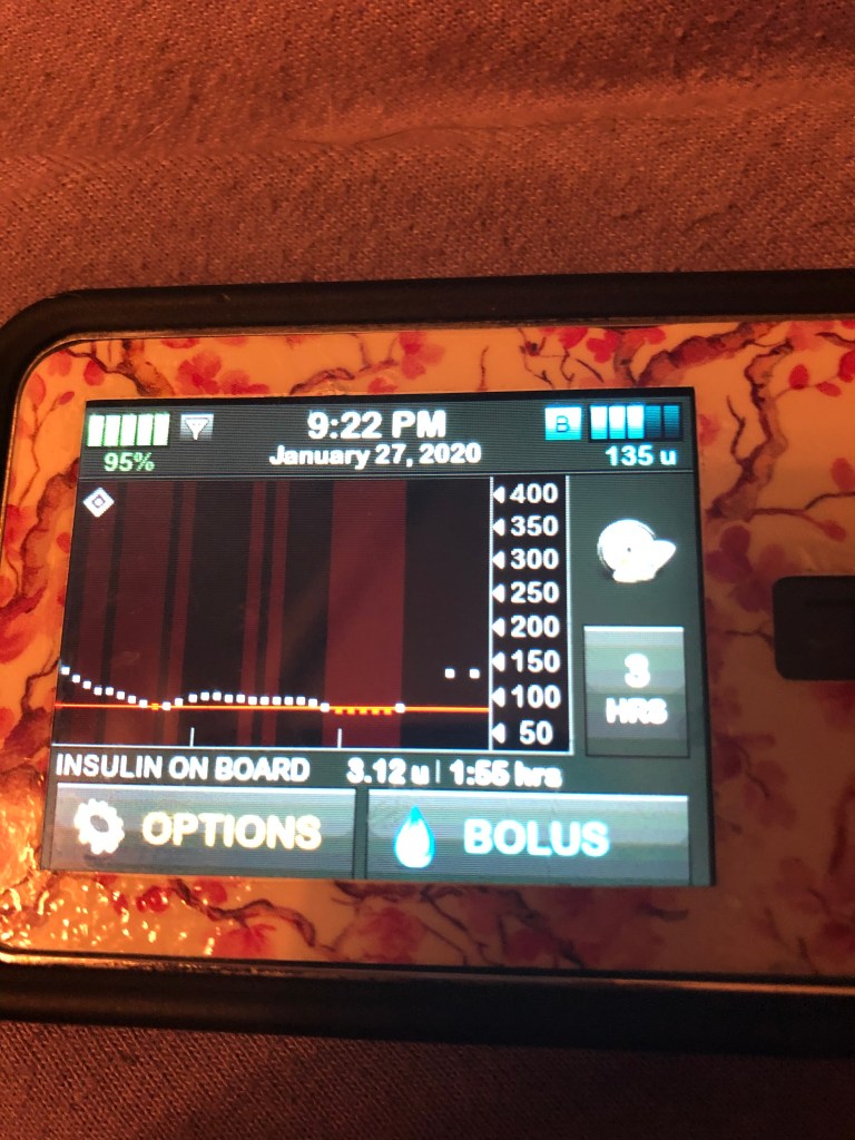 Photo of t:slim pump with insulin suspended from Basal IQ.
